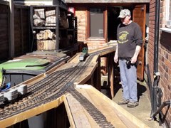 Tom and Glenis in their garden